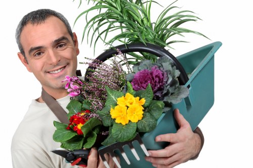 Professional horticulturists working in a Kensington garden